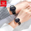 2866 OLEVS Marca Moda Casual Un par de reloj de pulsera para hombres y mujeres Material de la correa de cuero de la Pu Día / fecha Reloj de cuarzo Reloj de amante